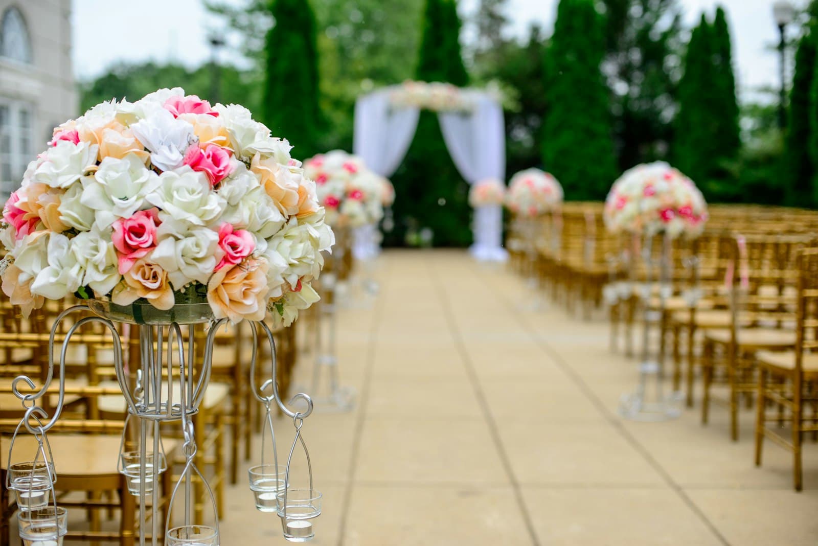 Wedding ceremony aisle lined with roses